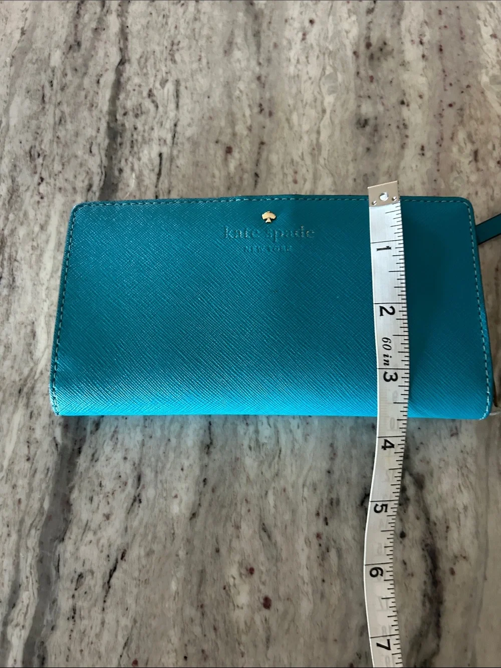 Kate Spade New York blue leather wallet with gold hardware